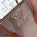 Louis Vuitton Taupe Freedom Bag M54841